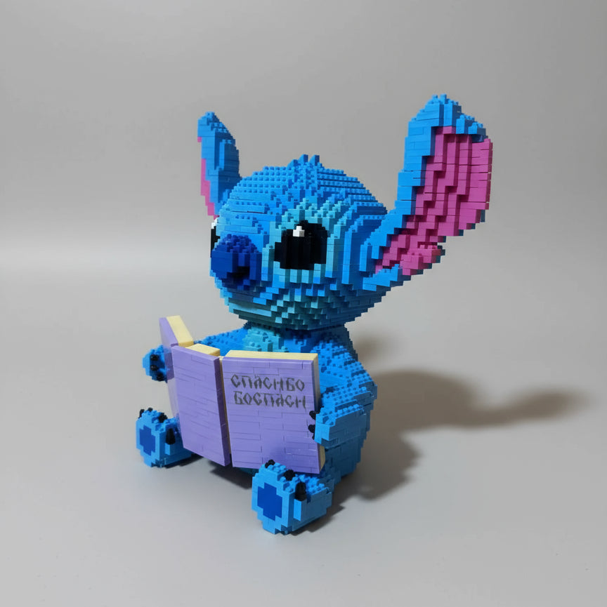 Blaues Wesen mit Buch | Bausteine