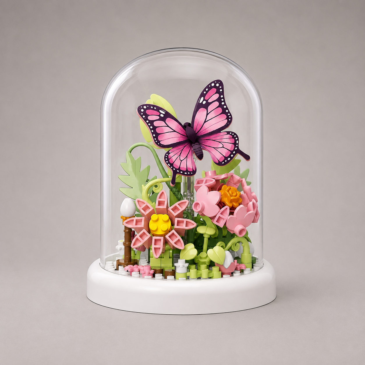 Rosa Schmetterling in Glasglocke | Bausteine