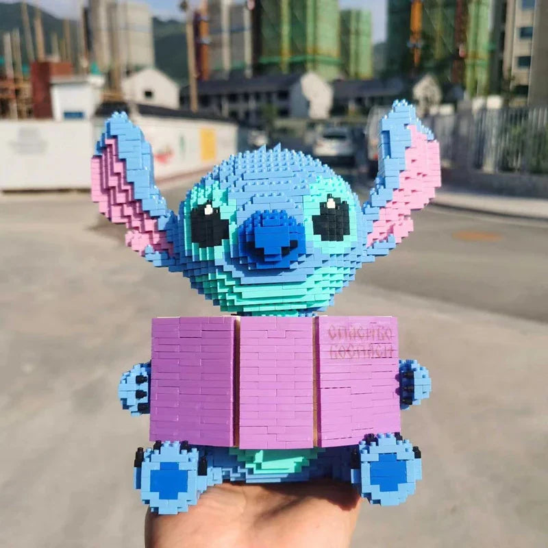 Blaues Wesen mit Buch | Bausteine