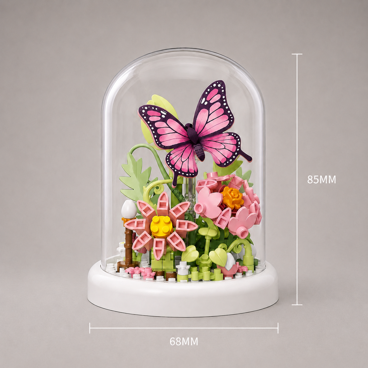 Rosa Schmetterling in Glasglocke | Bausteine