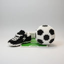 Fußballschuh auf Feld | Bausteine
