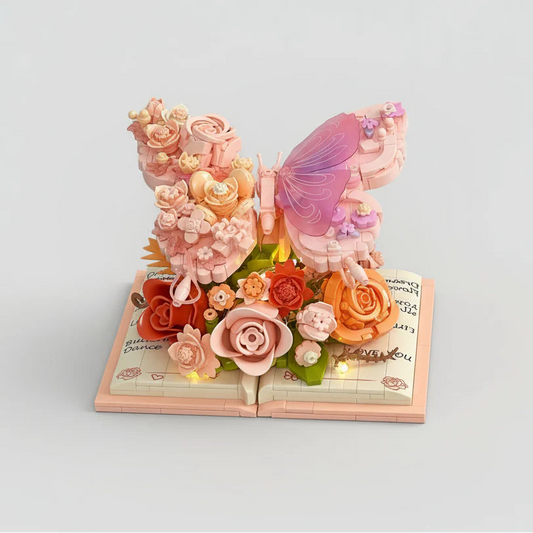 Rosa Schmetterling auf Buch | Bausteine