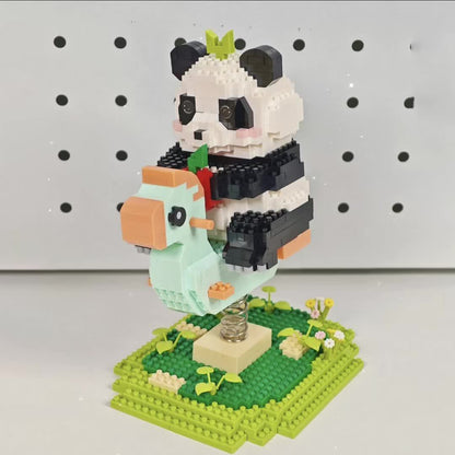 Panda auf der Wippe | Bausteine