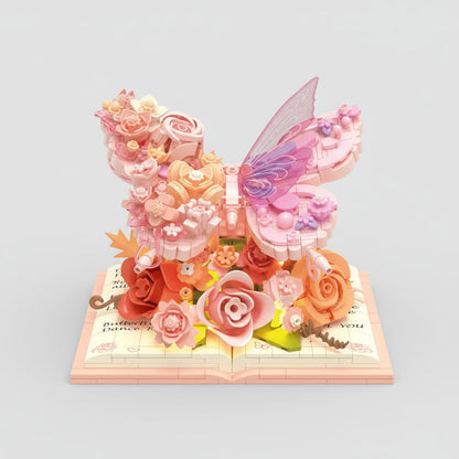 Rosa Schmetterling auf Buch | Bausteine