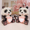Verliebte Pandas im Licht