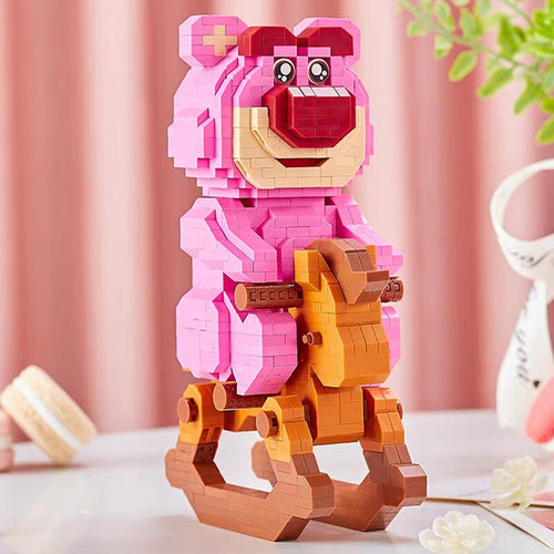 Rosa Bär auf Schaukelpferd  | Bausteine